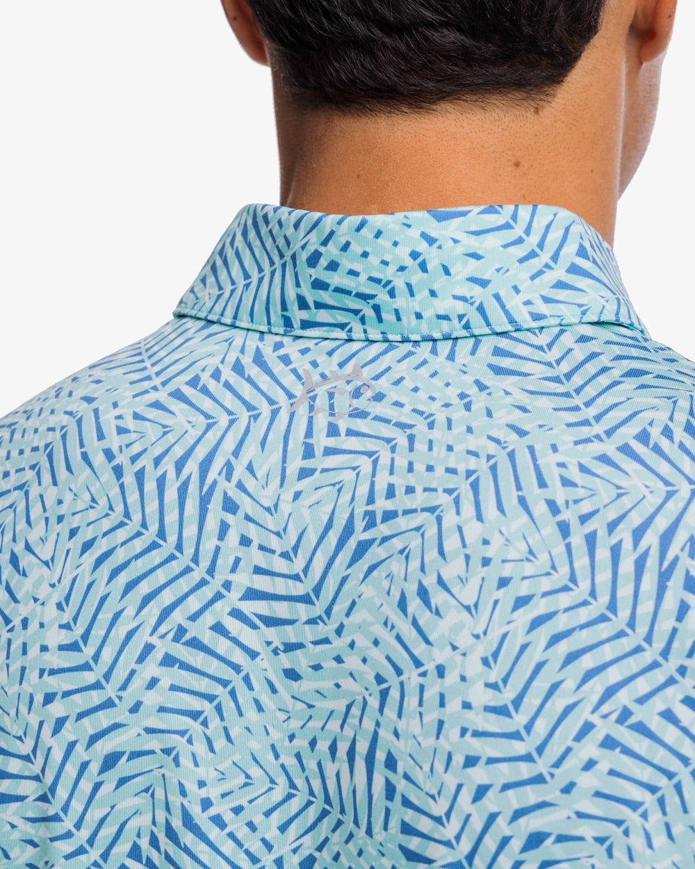 The yoke view of the Southern Tide Driver Vibin Palm Print Performance Polo Shirt by Southern Tide - Atlantic Blue