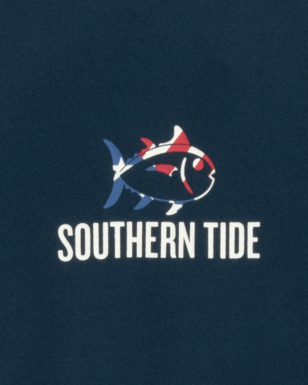 The pocket view of the Men's Flag Cutout Long Sleeve Performance T-Shirt by Southern Tide - Specular Blue