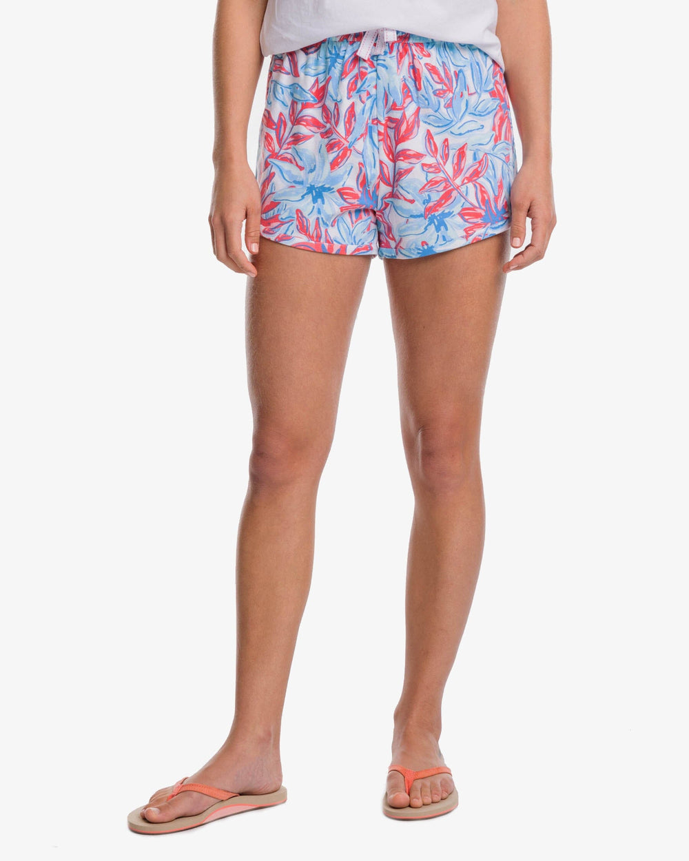 The front view of the Southern Tide Forever Floral Print Lounge Short by Southern Tide - Sunkist Coral