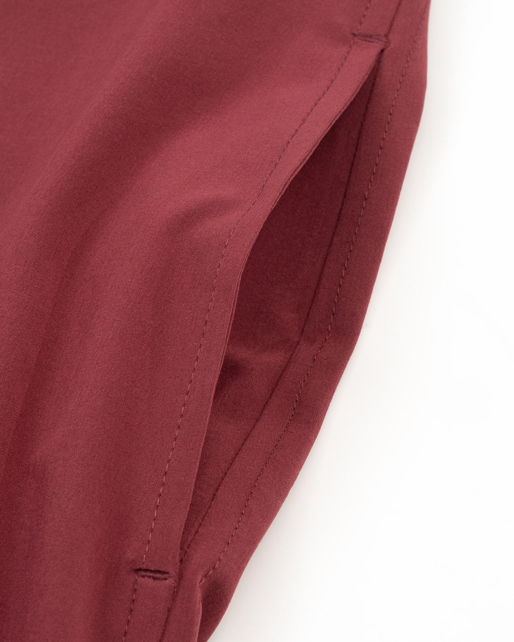 The pocket view of the Women's Red Gameday Dress by Southern Tide - Chianti