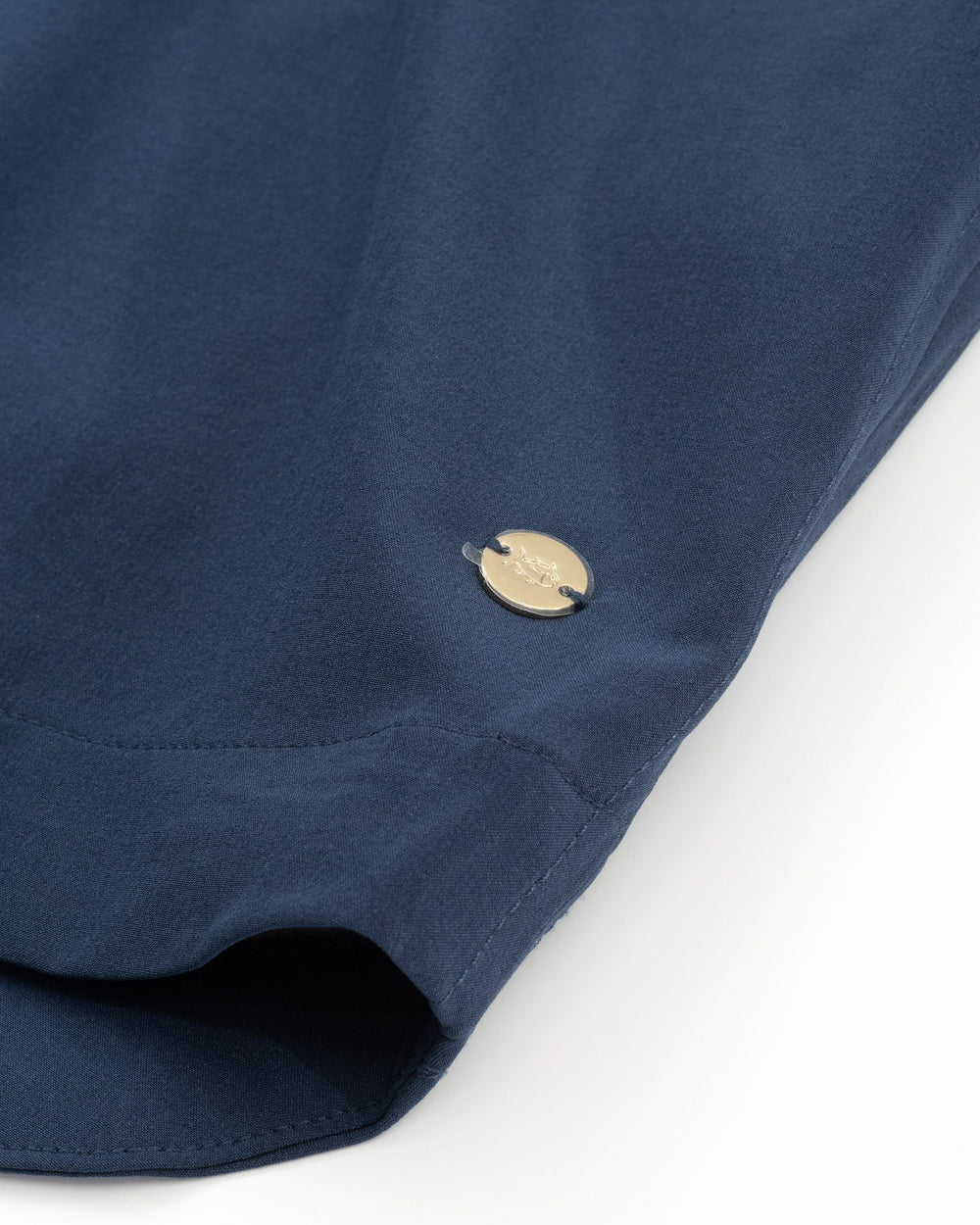 The hem of the Women's Navy Gameday Dress by Southern Tide - Navy