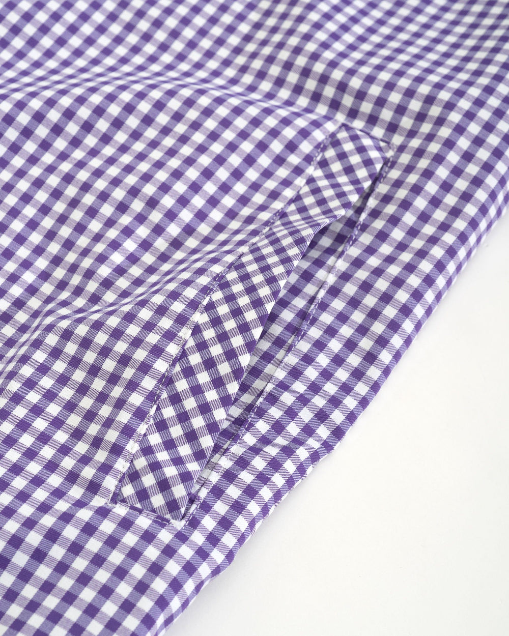The pocket of the Women's Gameday Kamryn Intercoastal Shirt Dress by Southern Tide - Regal Purple