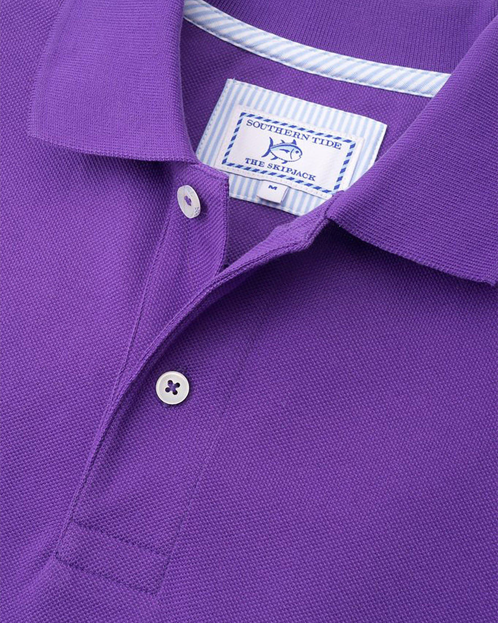 The detail of the Men's Purple Clemson Tigers Pique Polo Shirt by Southern Tide - Regal Purple