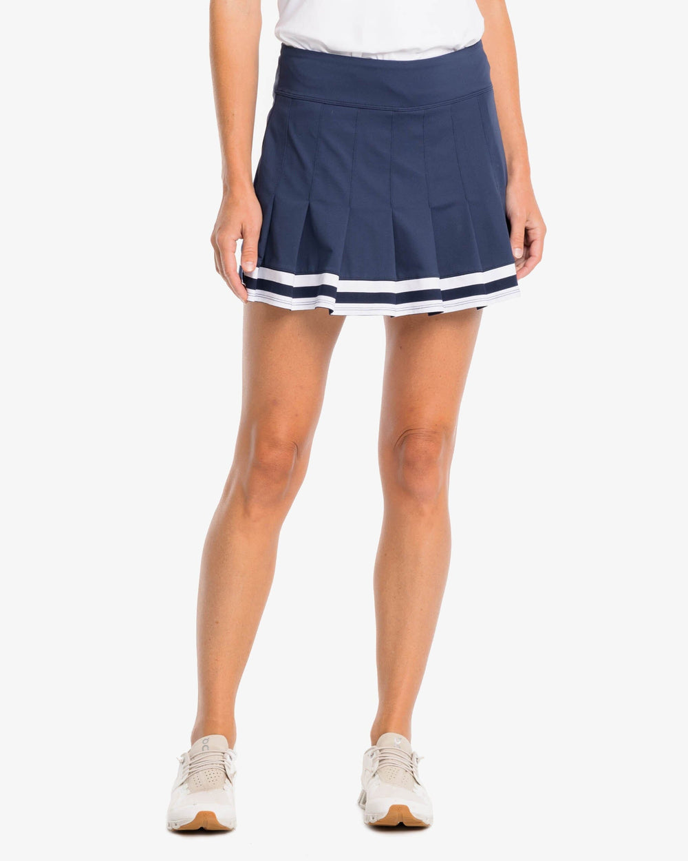 The front view of the Southern Tide Gwen Pleated Performance Skort by Southern Tide - Nautical Navy