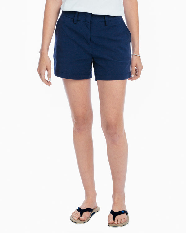 The model front view of the Women's Inlet 4 Inch Performance Short by Southern Tide - Nautical Navy