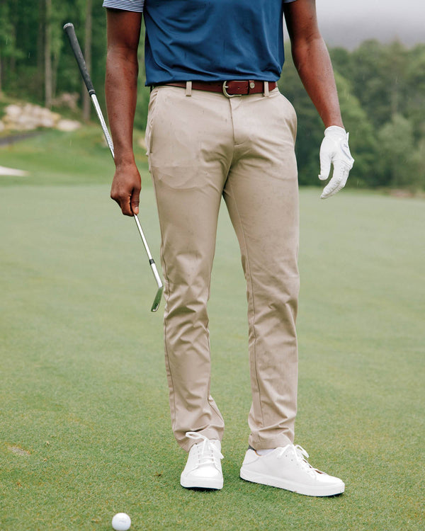 The front lifestyle view of the Men's Jack Performance Pant by Southern Tide - Sandstone Khaki
