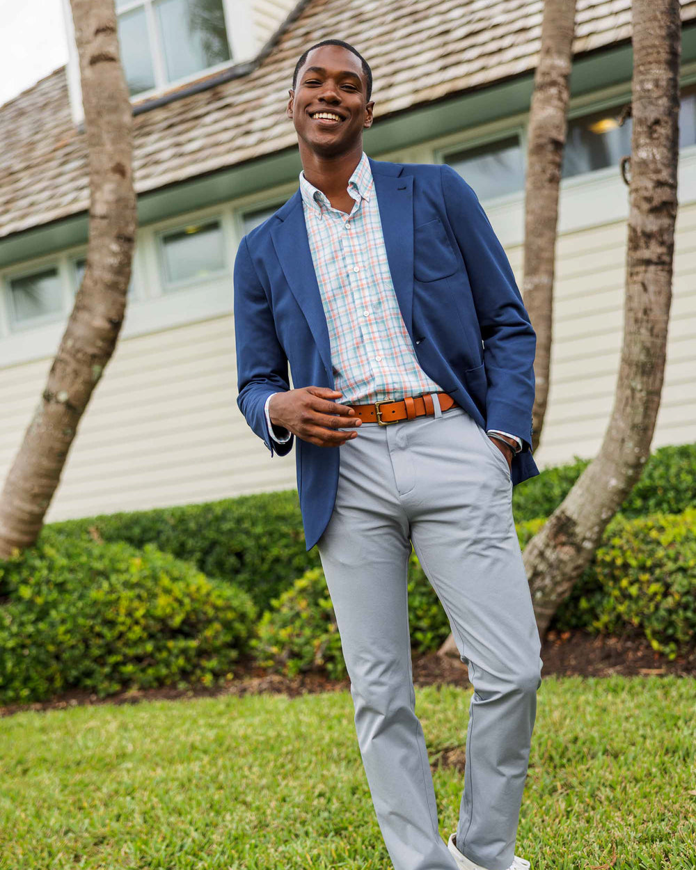 The lifestyle front view of the Men's Jack Performance Pant by Southern Tide - Steel Grey