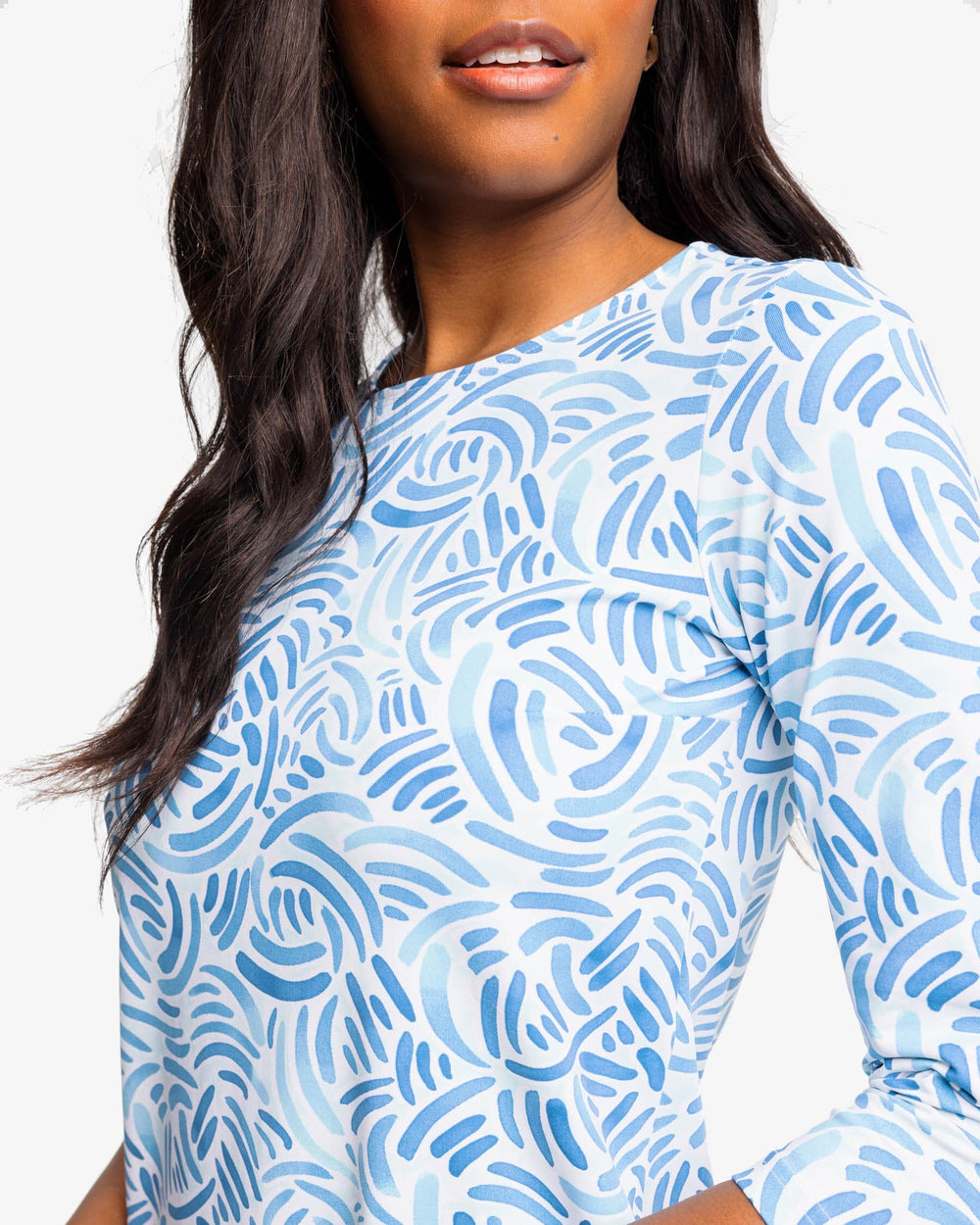 The detail view of the Southern Tide Leila Watercolor Whirl Printed Performance Dress by Southern Tide - Atlantic Blue