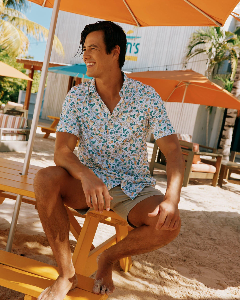 The lifestyle view of the Southern Tide Marg Madness Intercoastal Short Sleeve Button Down Shirt by Southern Tide - Classic White