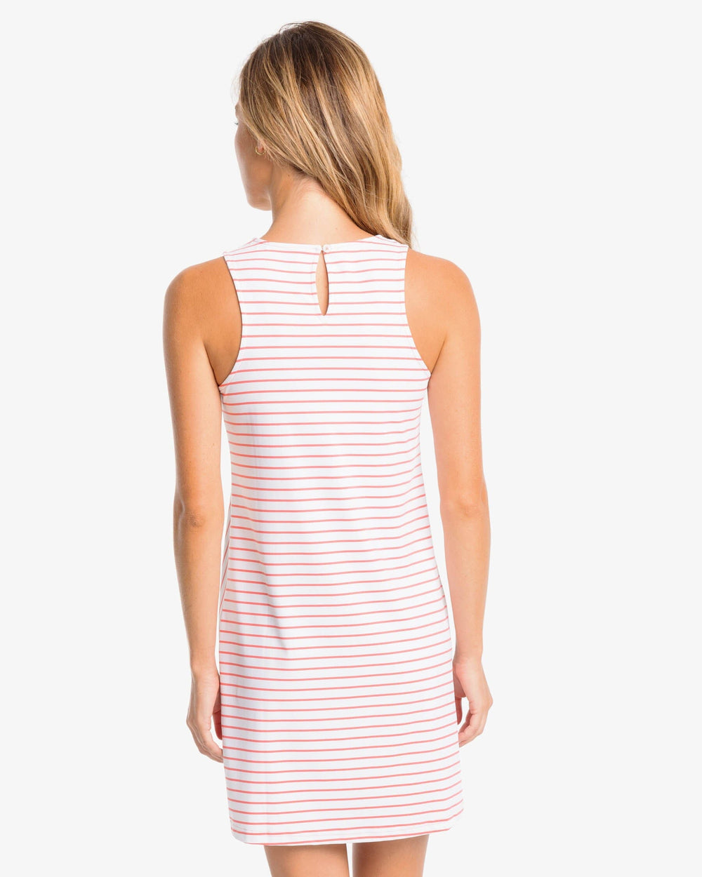 The back view of the Southern Tide Marlee Stripe Performance Dress by Southern Tide - Sunkist Coral