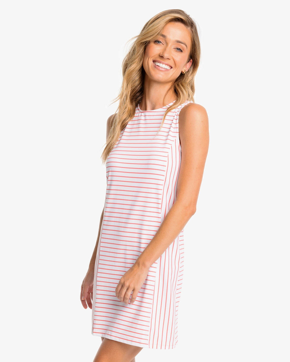 The front view of the Southern Tide Marlee Stripe Performance Dress by Southern Tide - Sunkist Coral