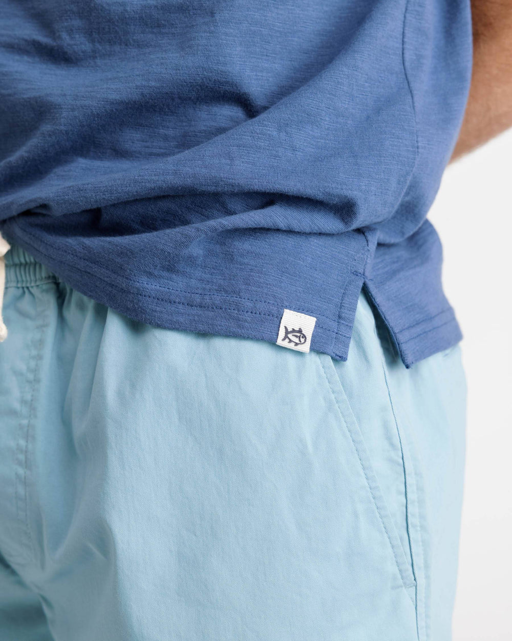 The label view of the Southern Tide Mesa Sun Farer Polo Shirt by Southern Tide - Aged Denim