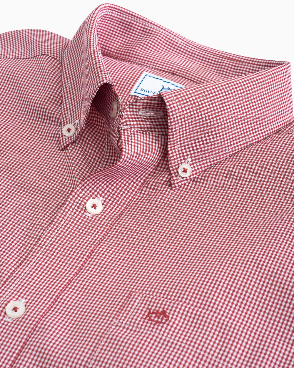 Arm vents of the Men's Red Micro Gingham Intercoastal Performance Sport Shirt by Southern Tide - true red