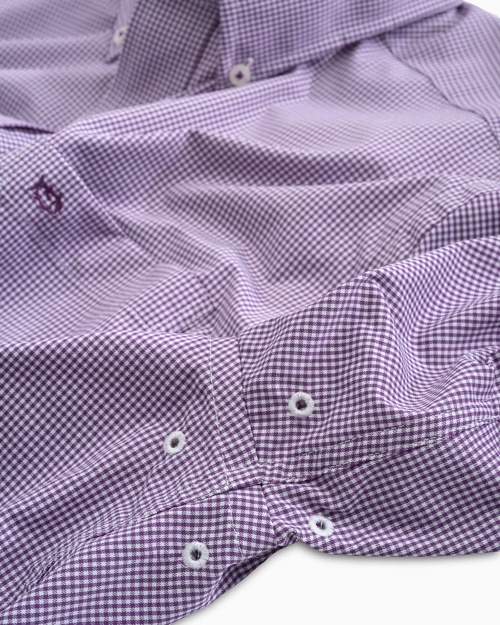 Arm vents of the Men's Purple Micro Gingham Intercoastal Performance Sport Shirt by Southern Tide - royal purple