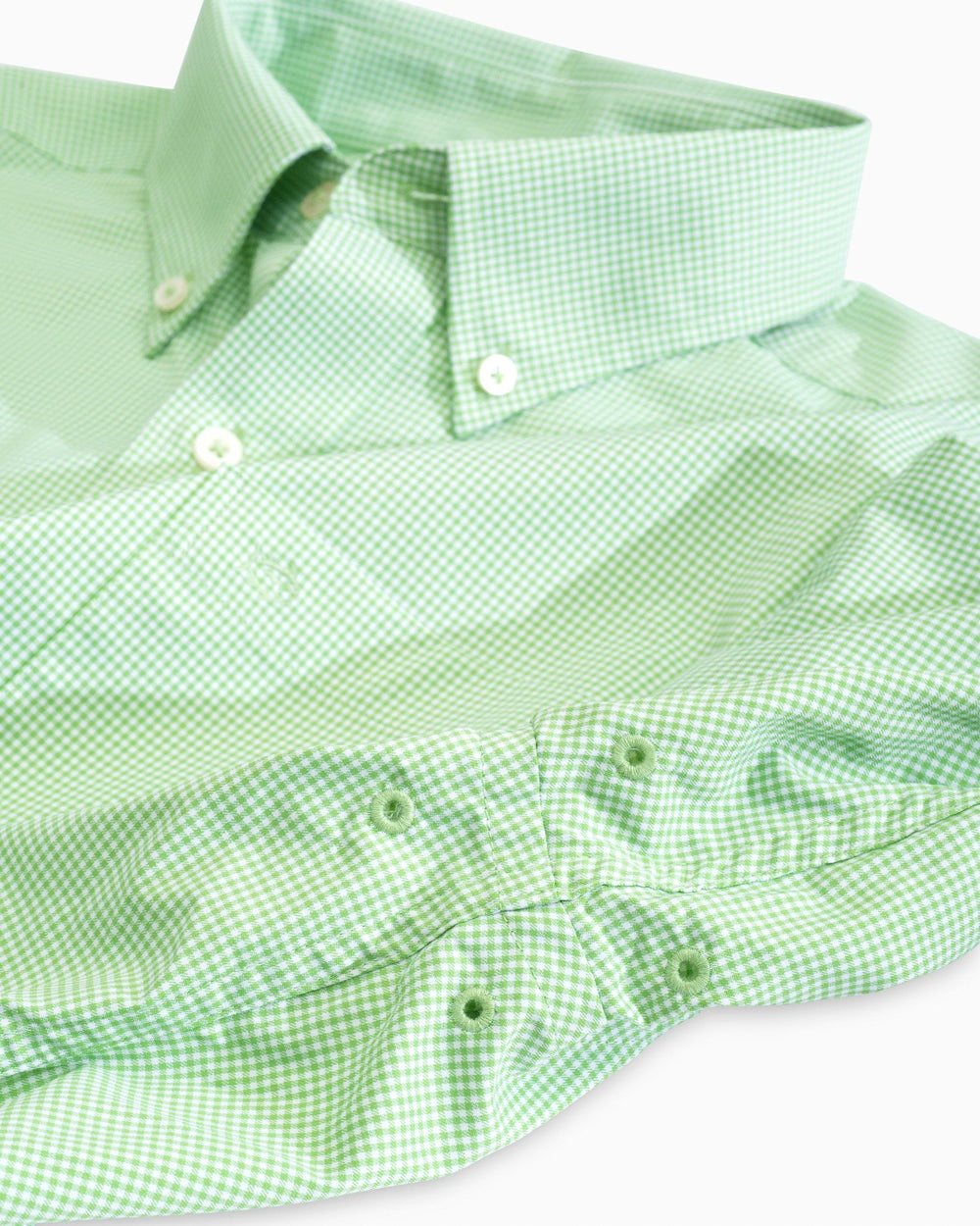 Arm vents of the Men's Green Micro Gingham Intercoastal Performance Sport Shirt by Southern Tide - Green Tea
