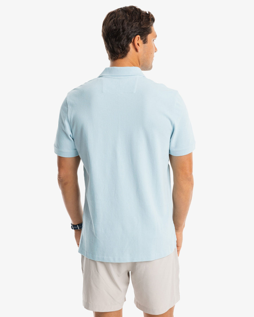 The model back view of the Men's New Skipjack Polo Shirt by Southern Tide - Aquamarine