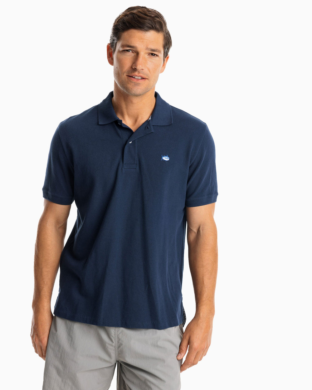 The model front view of the Men's New Skipjack Polo Shirt by Southern Tide - True Navy