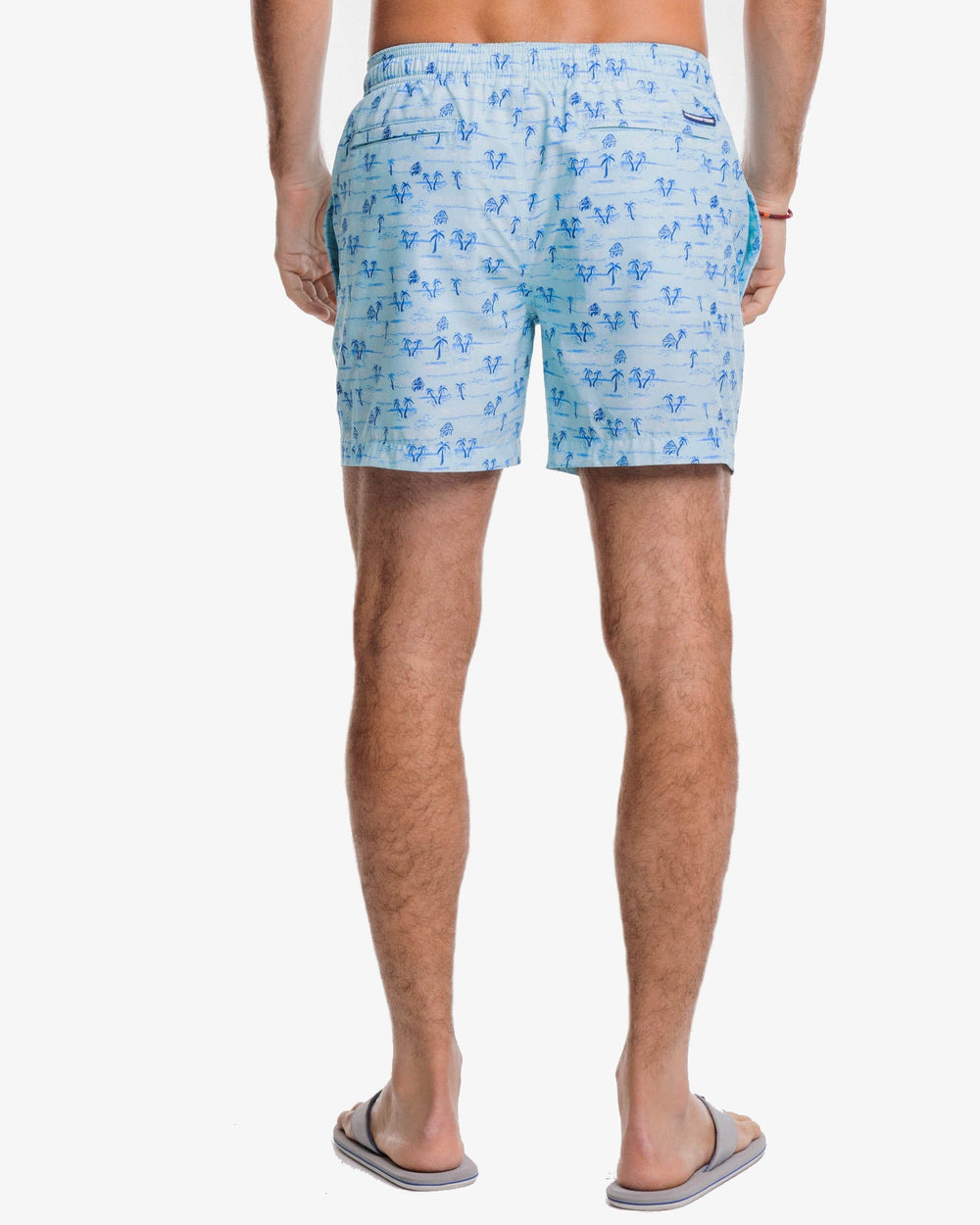 The back view of the Southern Tide Nice to Sea You Printed Swim Trunk by Southern Tide - Baltic Teal