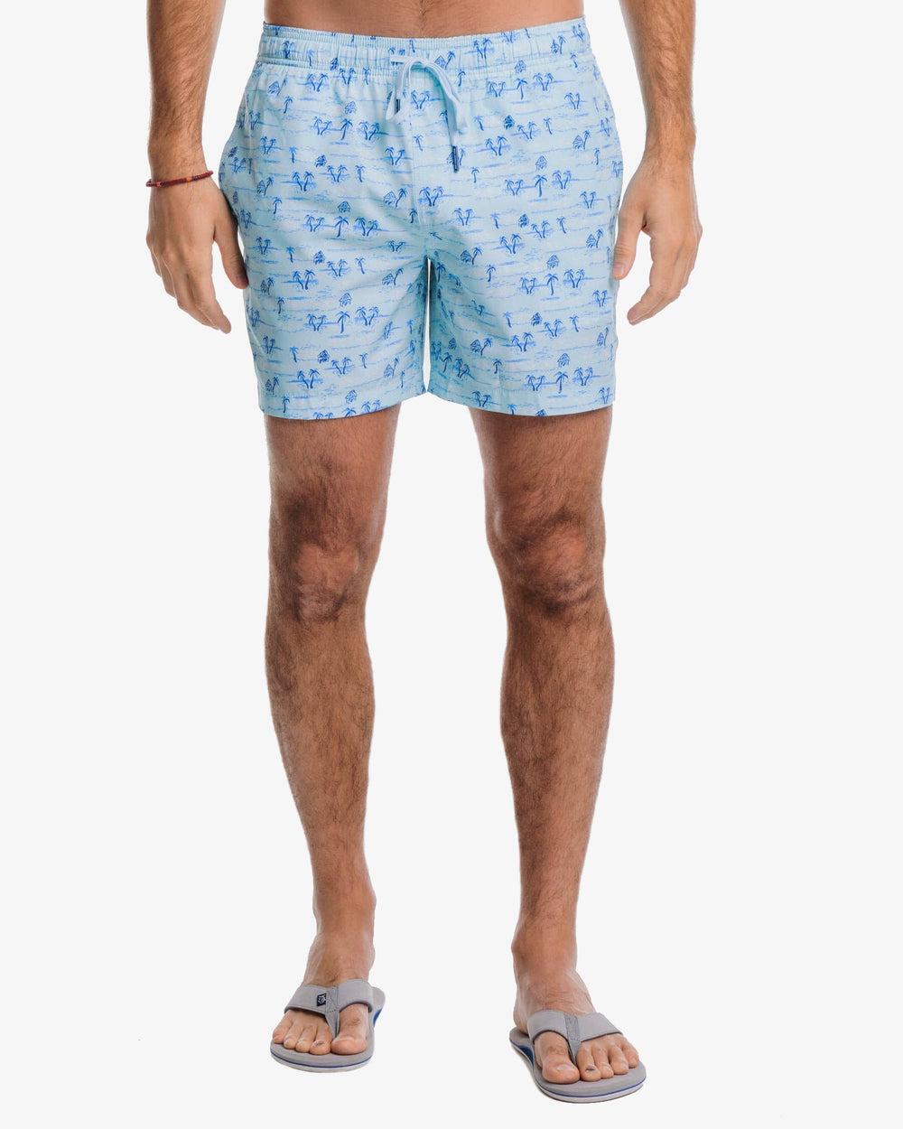 The front view of the Southern Tide Nice to Sea You Printed Swim Trunk by Southern Tide - Baltic Teal