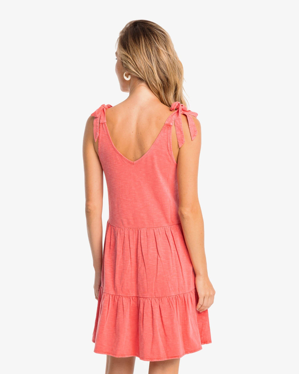 The back view of the Southern Tide Nicole Sun Farer Tiered Tank Dress by Southern Tide - Sunkist Coral