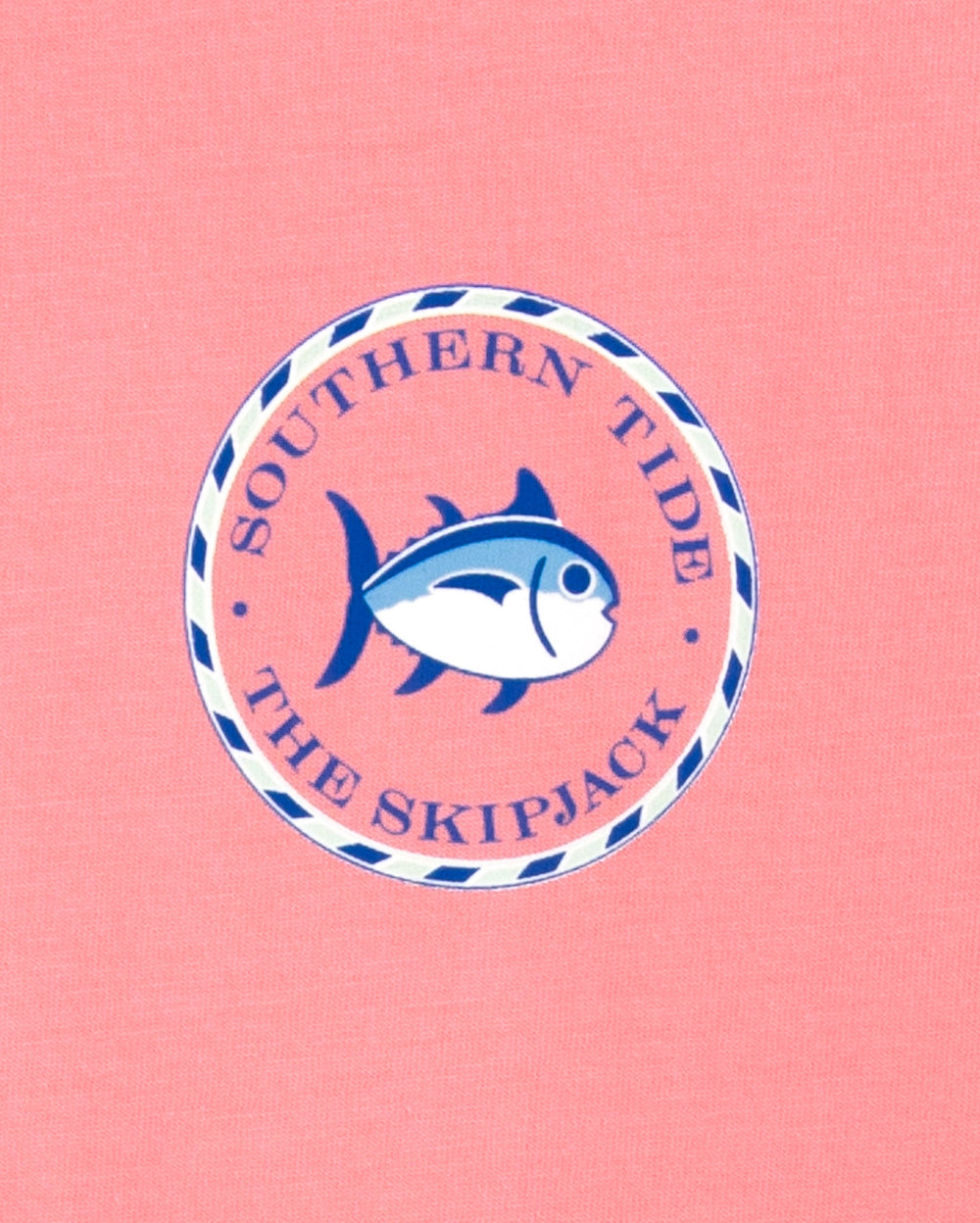 The model pocket view of the Women's Original Skipjack Medallion T-Shirt by Southern Tide - Citrus Punch