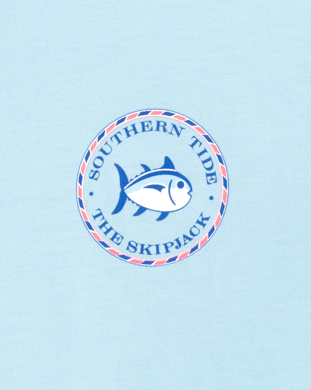The model pocket view of the Women's Original Skipjack Medallion T-Shirt by Southern Tide - Dream Blue