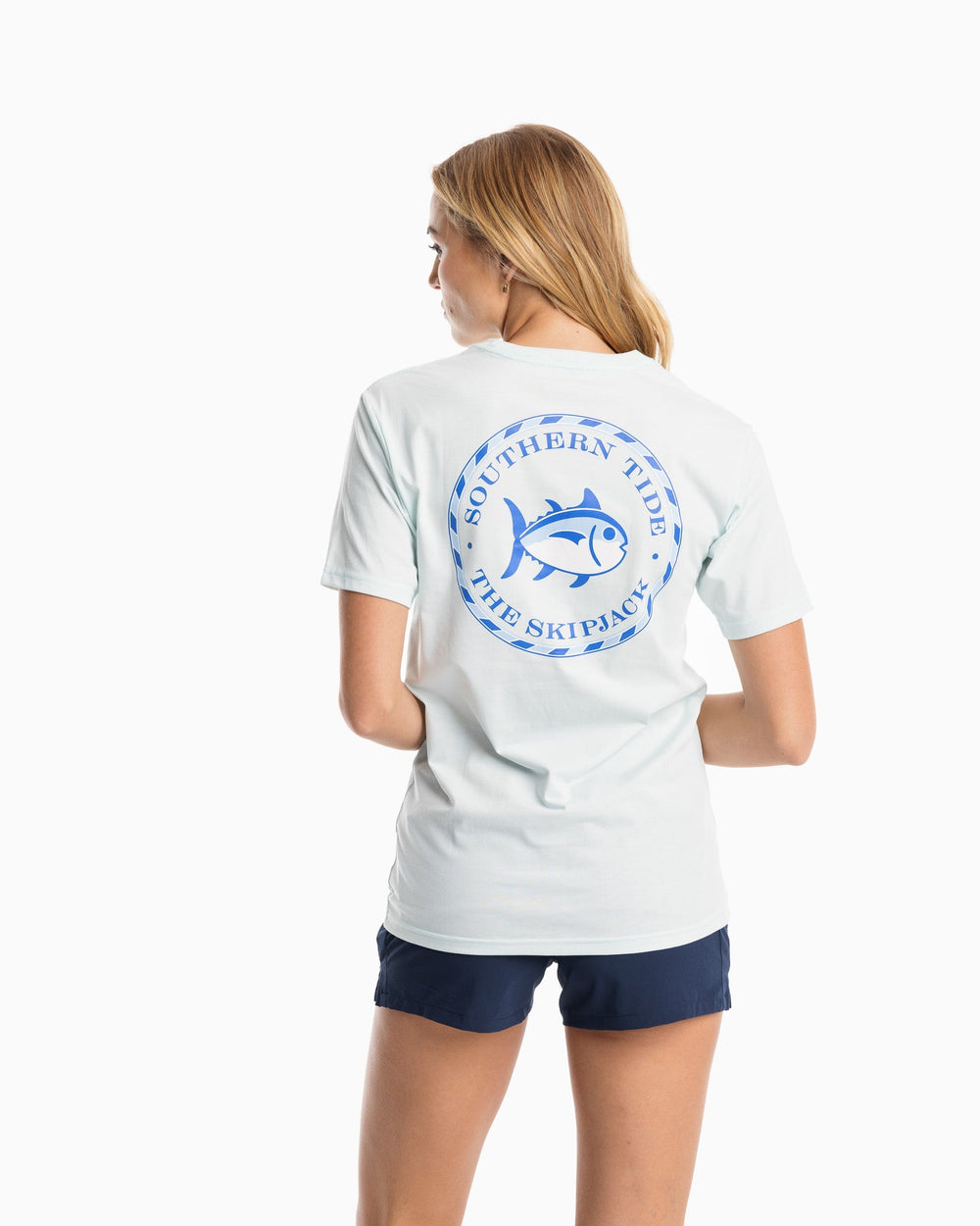 The model back view of the Women's Original Skipjack Medallion T-Shirt by Southern Tide - Turquoise Mist