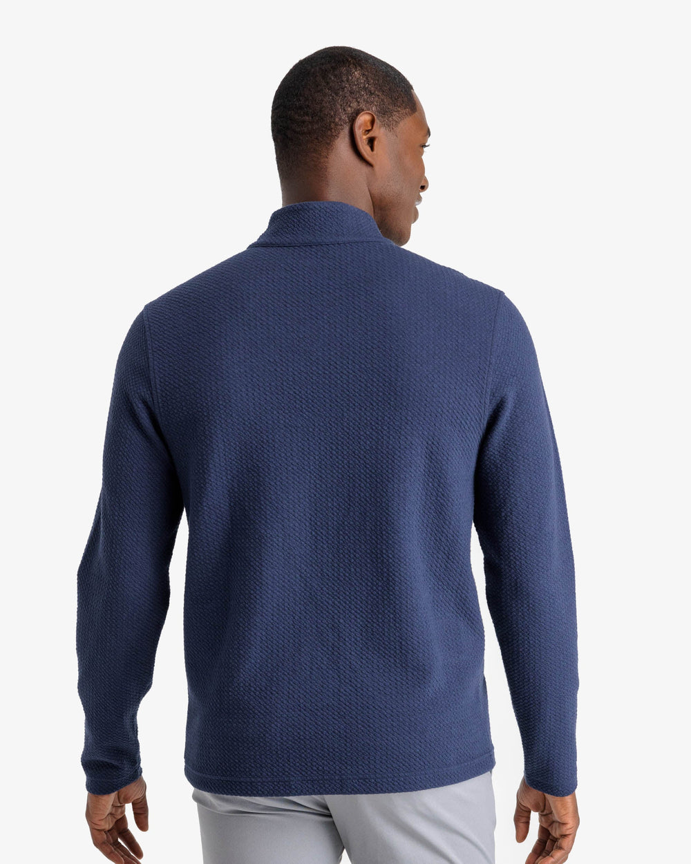 The back view of the Outbound Quarter Zip Pullover by Southern Tide - Heather True Navy