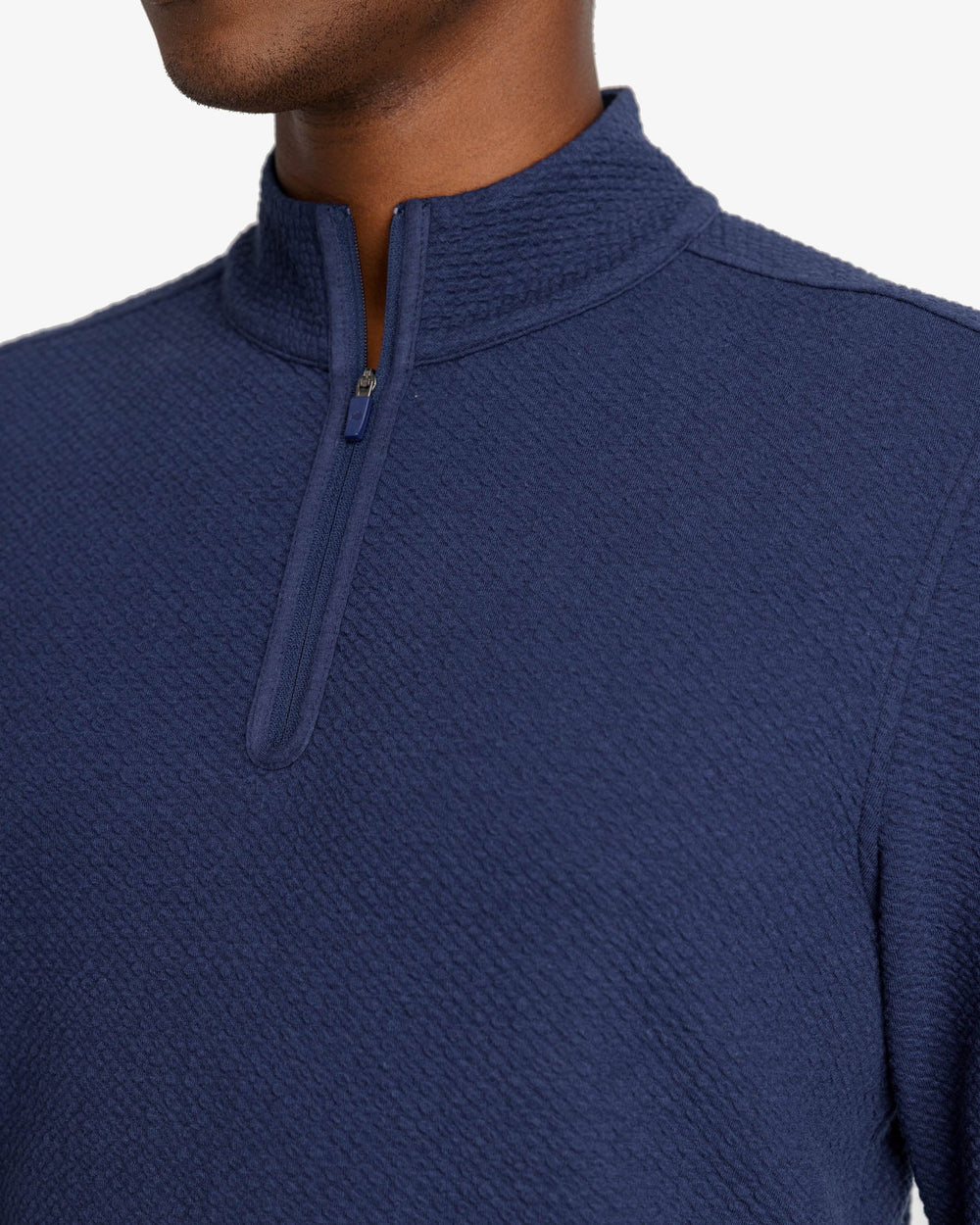 The detail view of the Outbound Quarter Zip Pullover by Southern Tide - Heather True Navy
