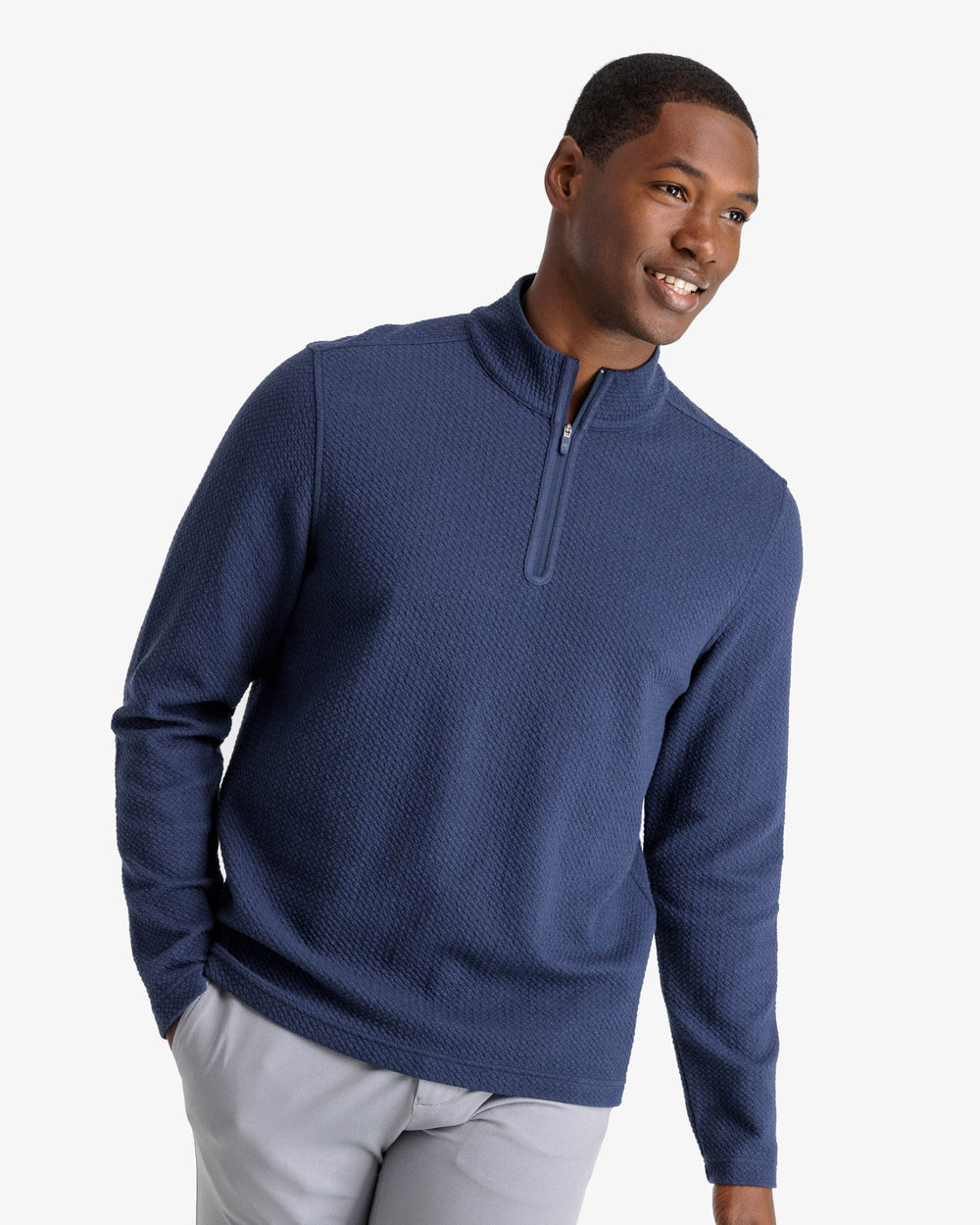 The front view of the Outbound Quarter Zip Pullover by Southern Tide - Heather True Navy