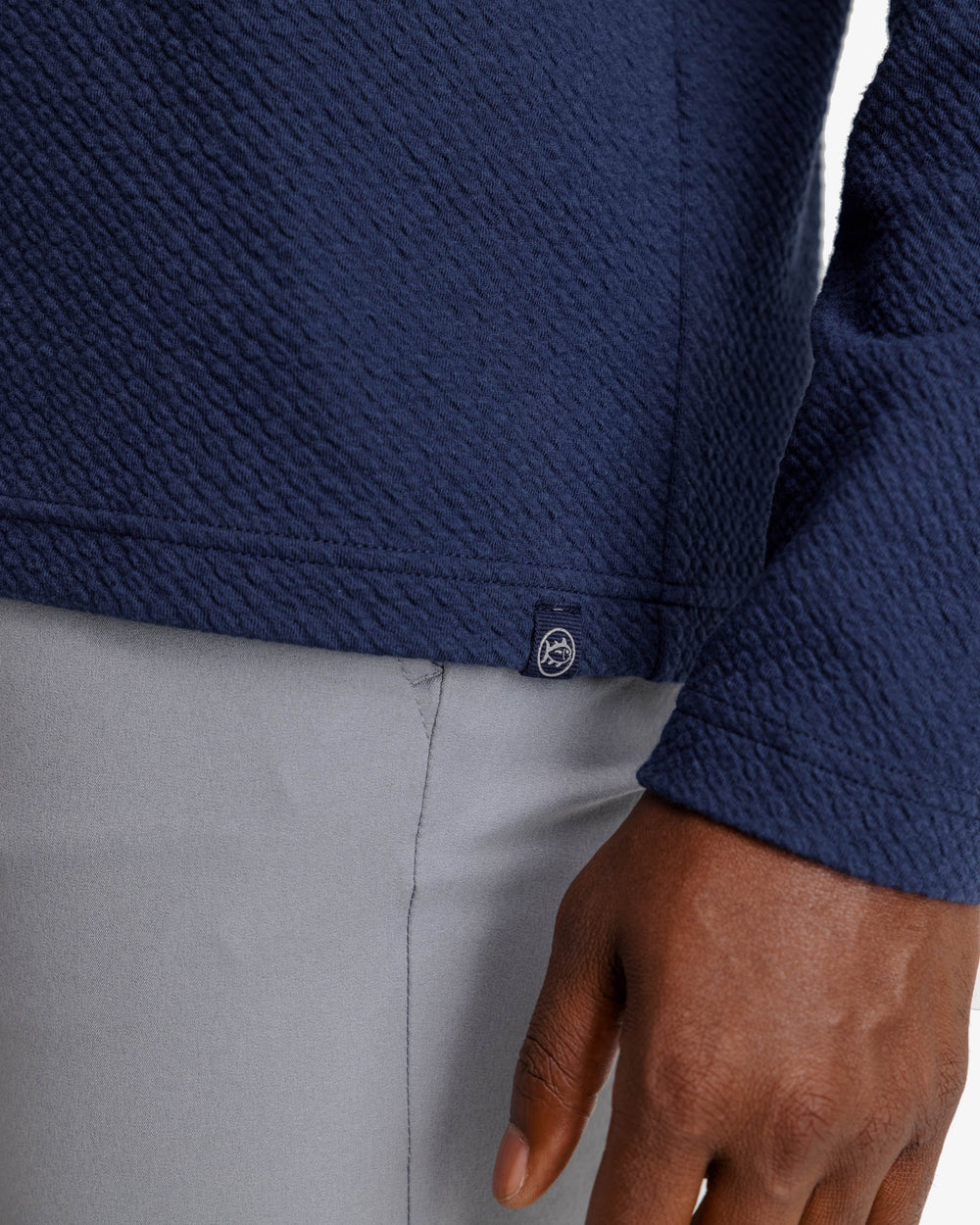 The label view of the Outbound Quarter Zip Pullover by Southern Tide - Heather True Navy