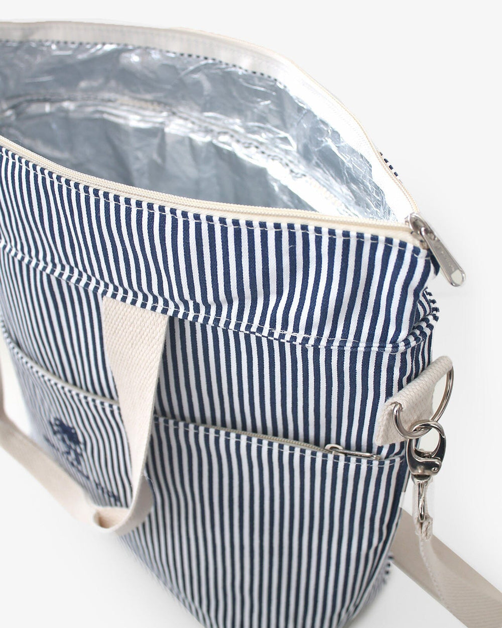 The open view of the Palm Stripes Cooler by Southern Tide - Navy