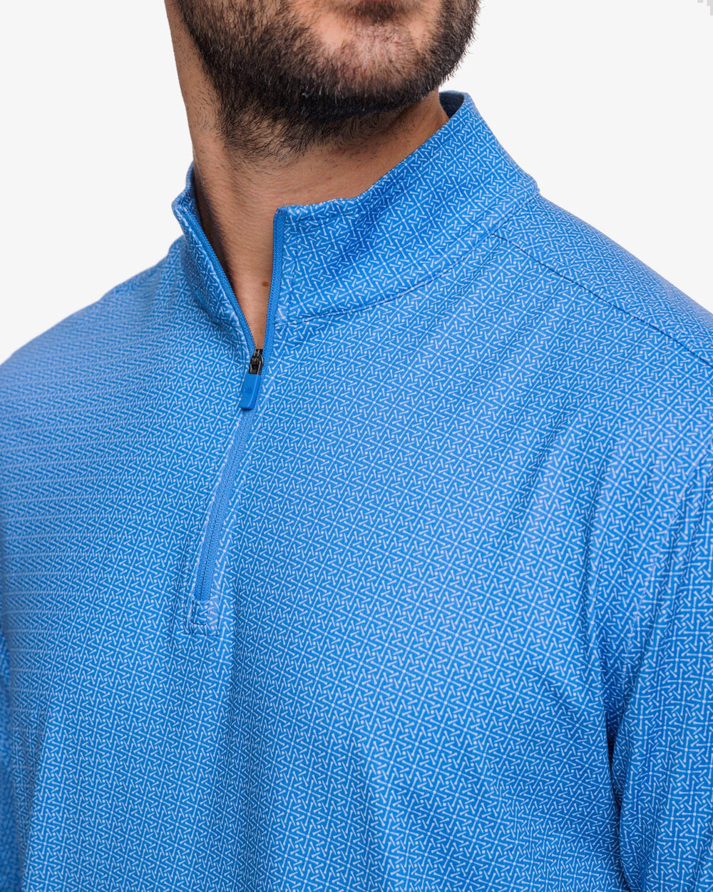 The detail view of the Southern Tide Pine Ridge Print Cruiser Quarter Zip Pullover by Southern Tide - Atlantic Blue