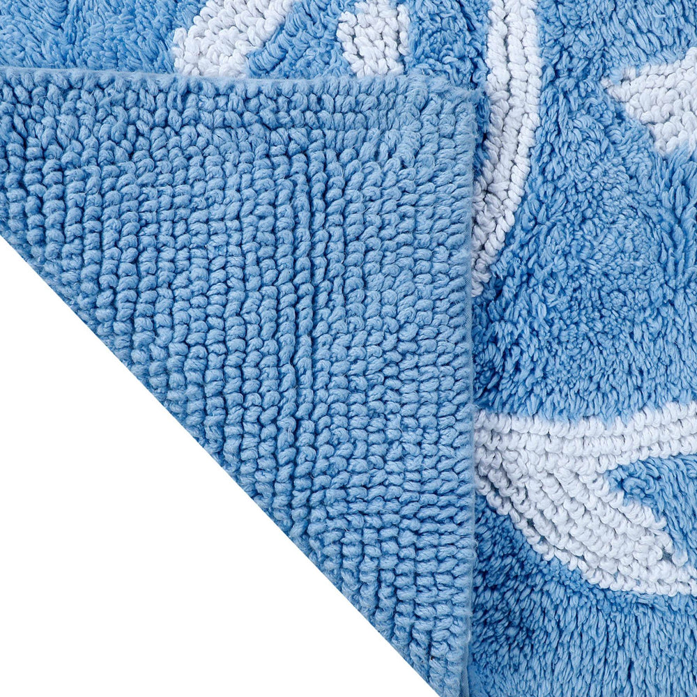 The flip view of the Reversible Skipjack Bath Rug by Southern Tide - Little Boy Blue