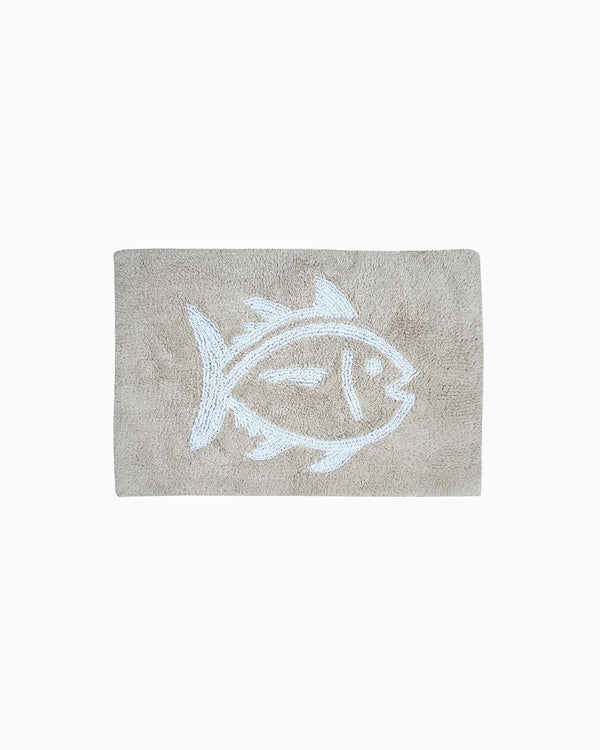 The front view of the Reversible Skipjack Bath Rug by Southern Tide - Sand