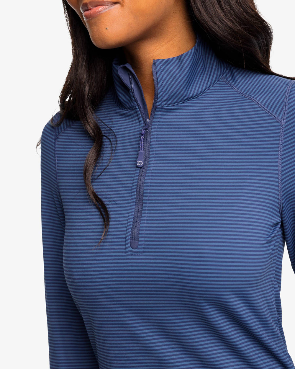 The detail view of the Runaround Performance Quarter Zip Pullover by Southern Tide - Nautical Navy