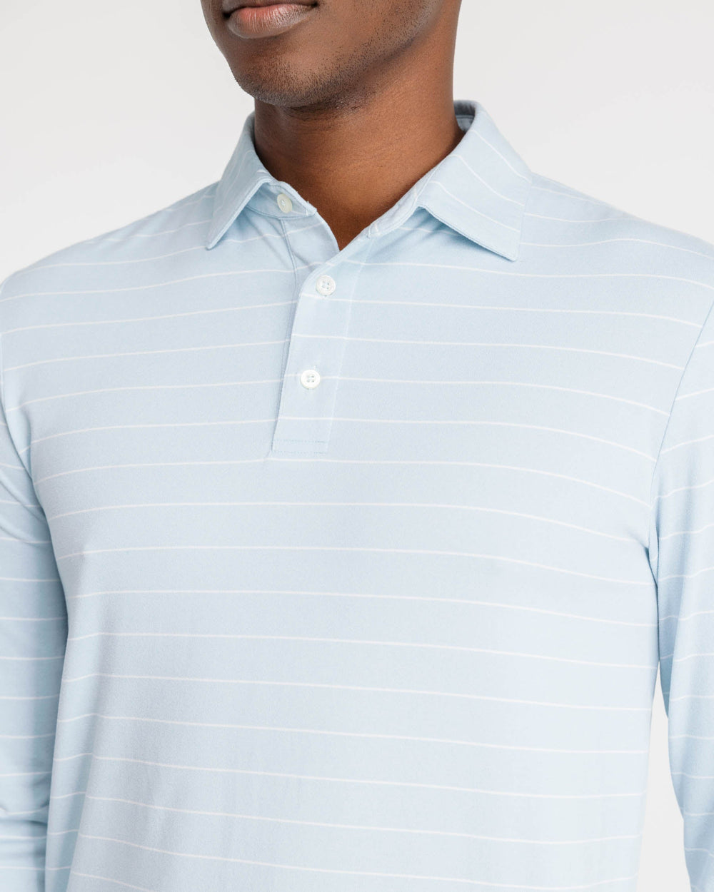 The detail view of the Ryder Bartlett Stripe Performance Polo Shirt by Southern Tide - Heather Aquamarine