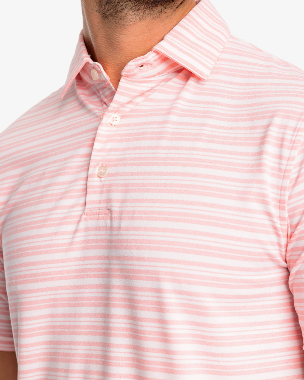 The detail view of the Southern Tide Ryder Heather Bombay Striped Polo Shirt by Southern Tide - Heather Flamingo Pink