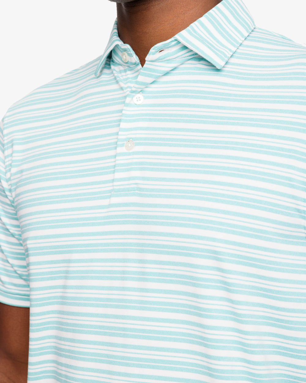 The detail view of the Southern Tide Ryder Heather Bombay Striped Polo Shirt by Southern Tide - Heather Tidal Wave