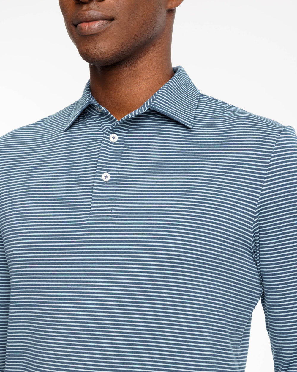 The detail view of the Ryder Heather Montefuma Performance Long Sleeve Polo Shirt by Southern Tide - Heather Insignia Blue