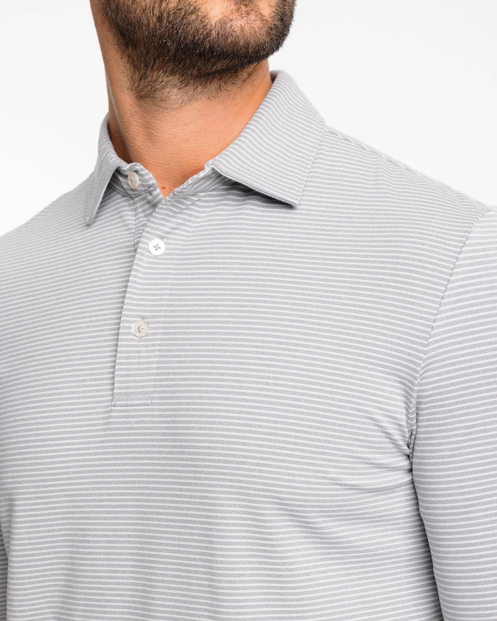 The detail view of the Ryder Heather Montefuma Performance Long Sleeve Polo Shirt by Southern Tide - Heather Steel Grey
