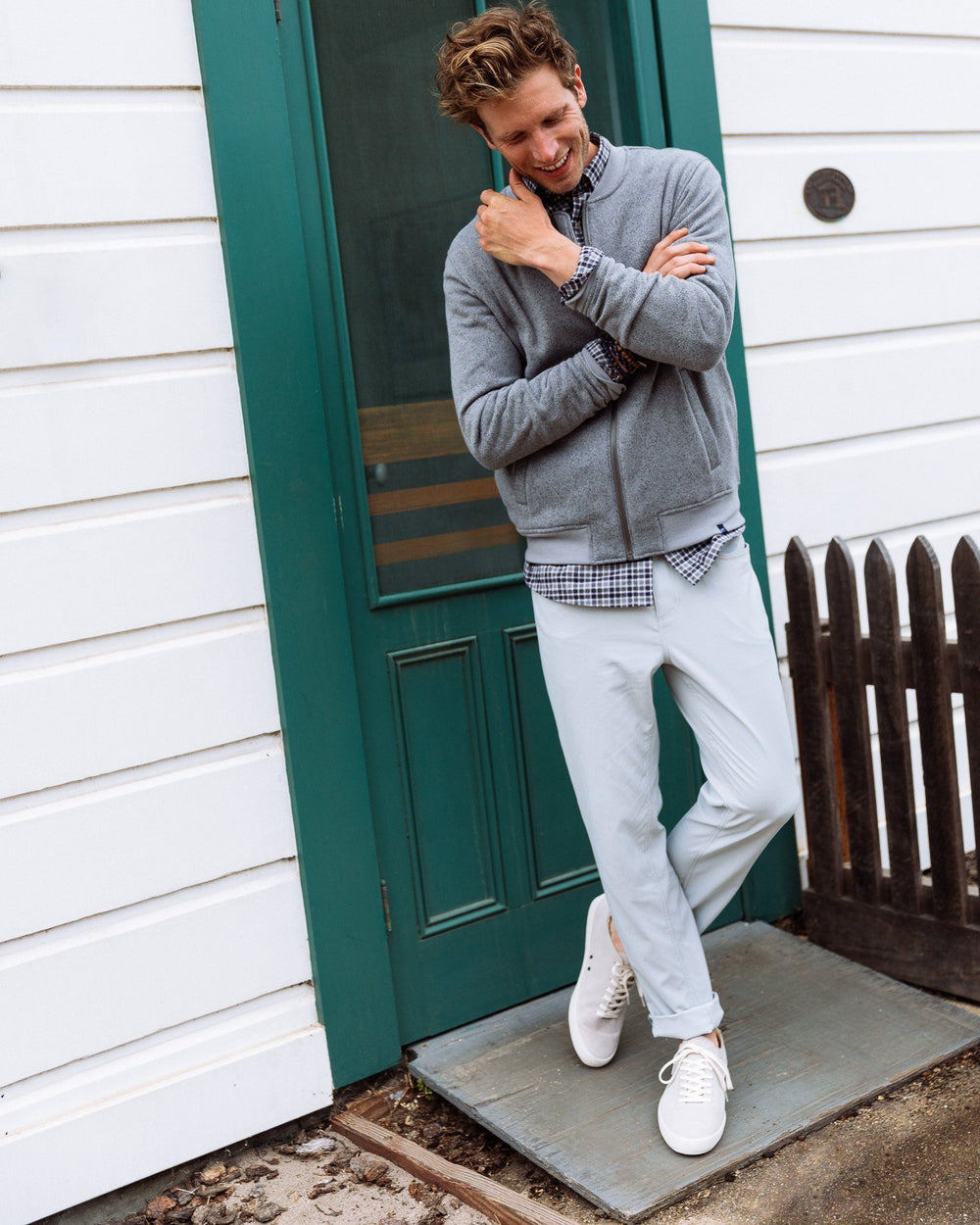 The lifestyle view of the Southern Tide Intercoastal Performance Pant by Southern Tide - Seagull Grey