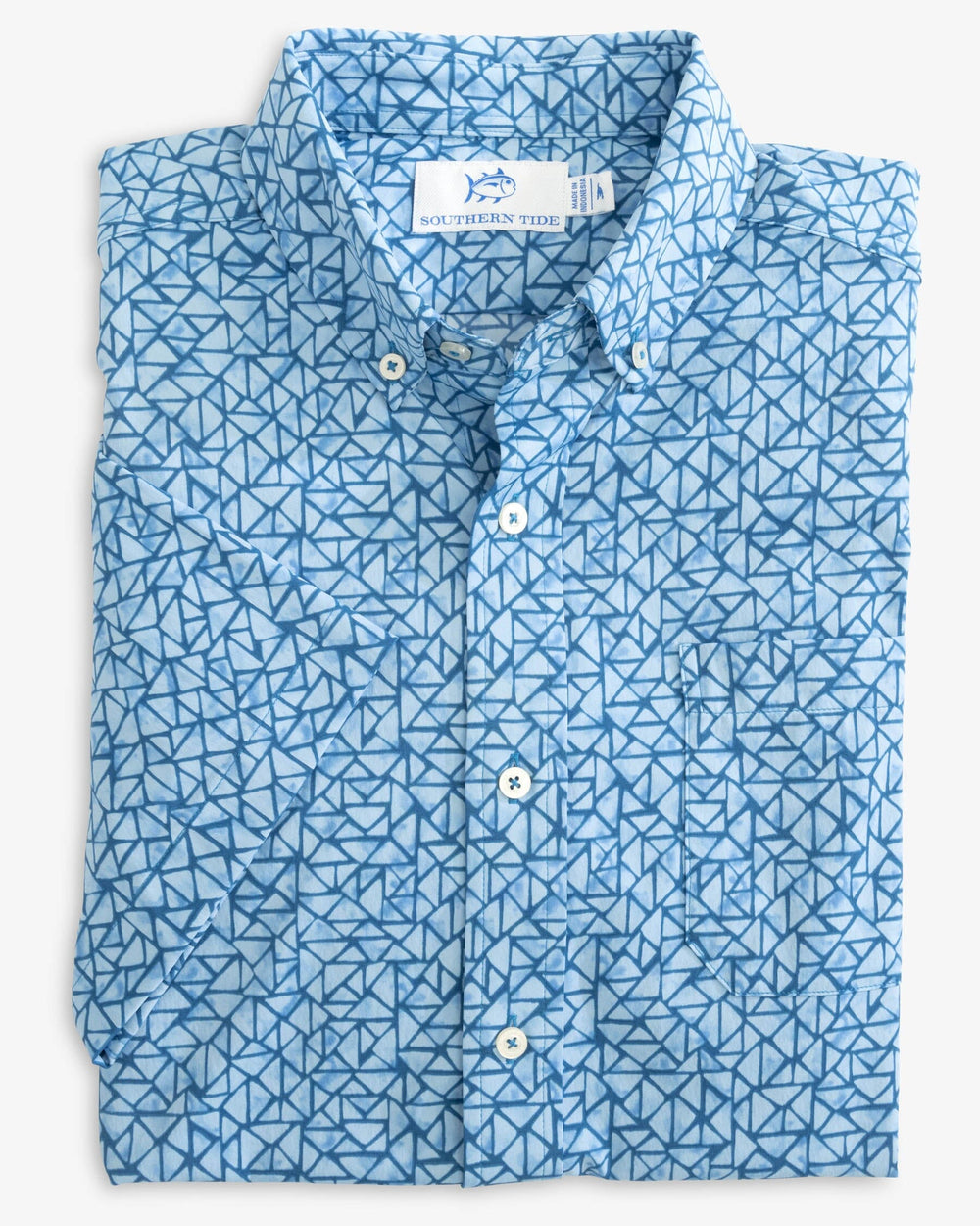 The folded view of the Southern Tide Saturday Soiree Intercoastal Short Sleeve Button Down Shirt by Southern Tide - Atlantic Blue