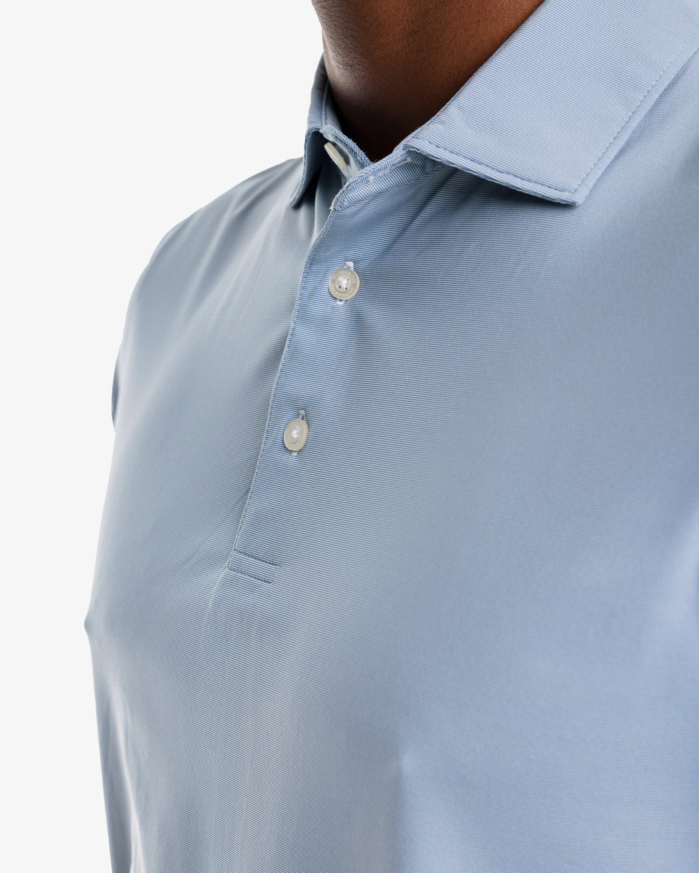 The model detail view of the Men's Sawgrass Stripe brrr°®-eeze Performance Polo Shirt by Southern Tide - Blue Ridge