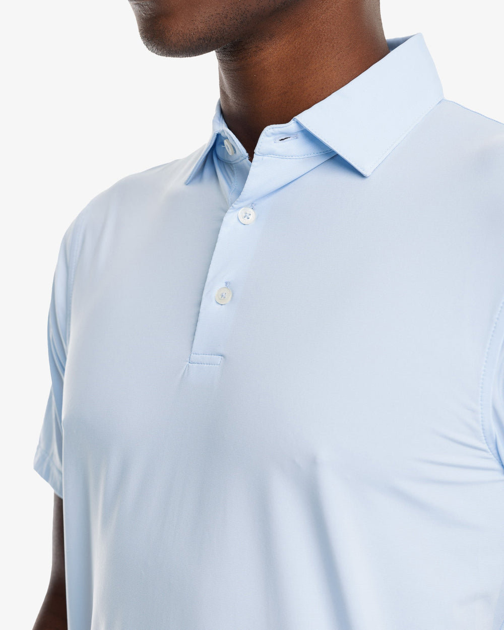 The model detail view of the Men's Sawgrass Stripe brrr°®-eeze Performance Polo Shirt by Southern Tide - Sky Blue