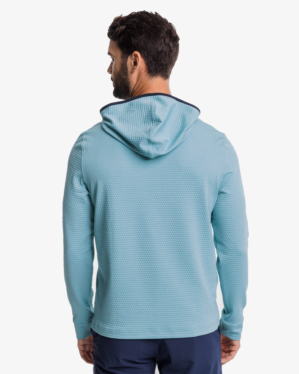 The back view of the Southern Tide Scuttle Heather Performance Quarter Zip Hoodie by Southern Tide - Heather Ocean Teal