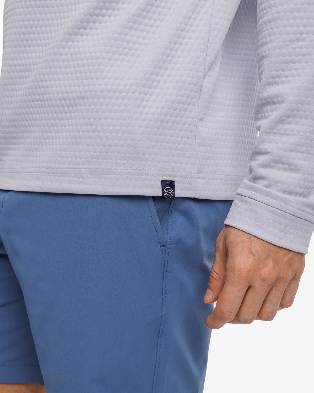 The label detail view of the Southern Tide Scuttle Heather Quarter Zip Pullover by Southern Tide - Heather Slate Grey