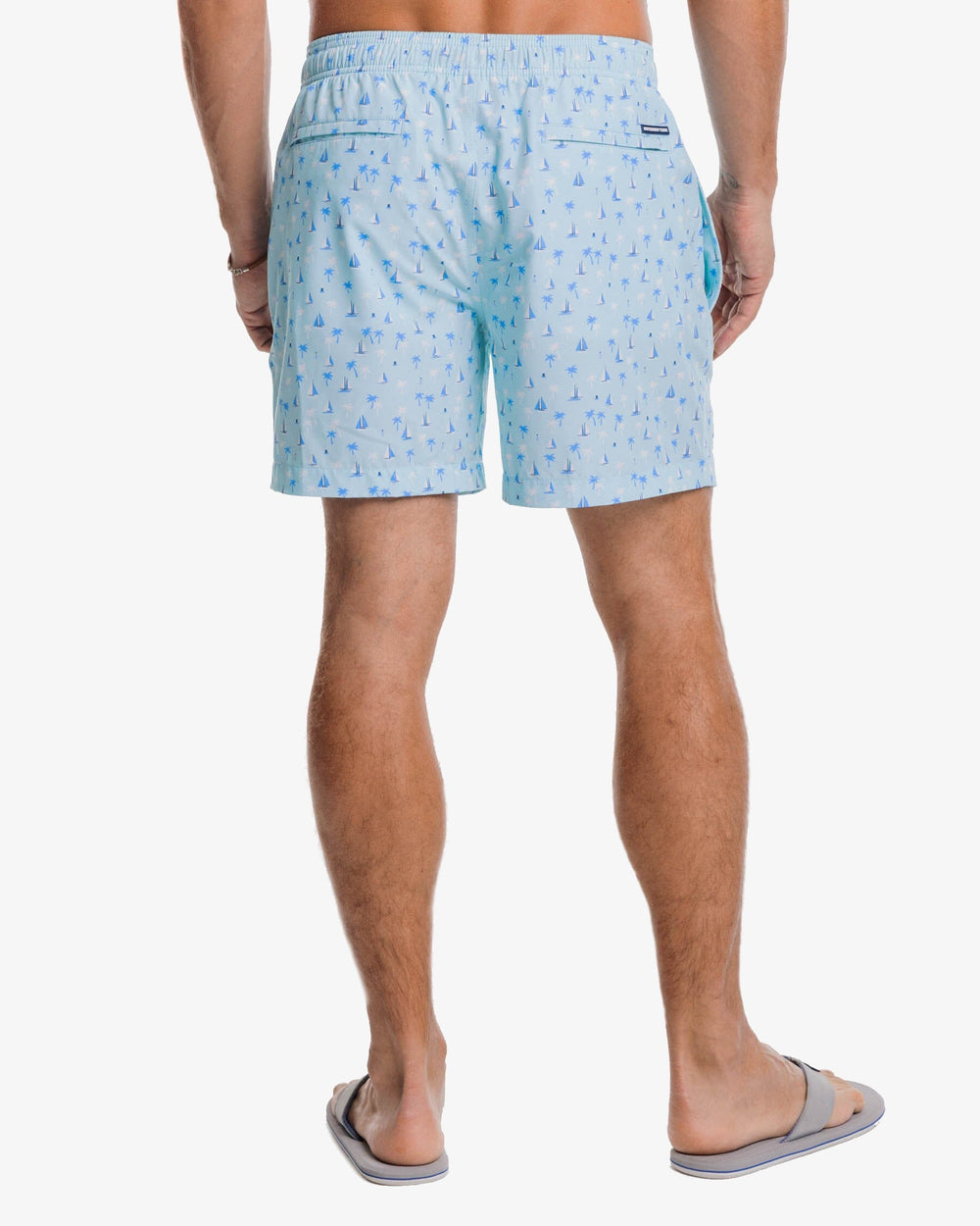 The back view of the Southern Tide Seascape Sailing Printed Swim Trunk by Southern Tide - Baltic Teal