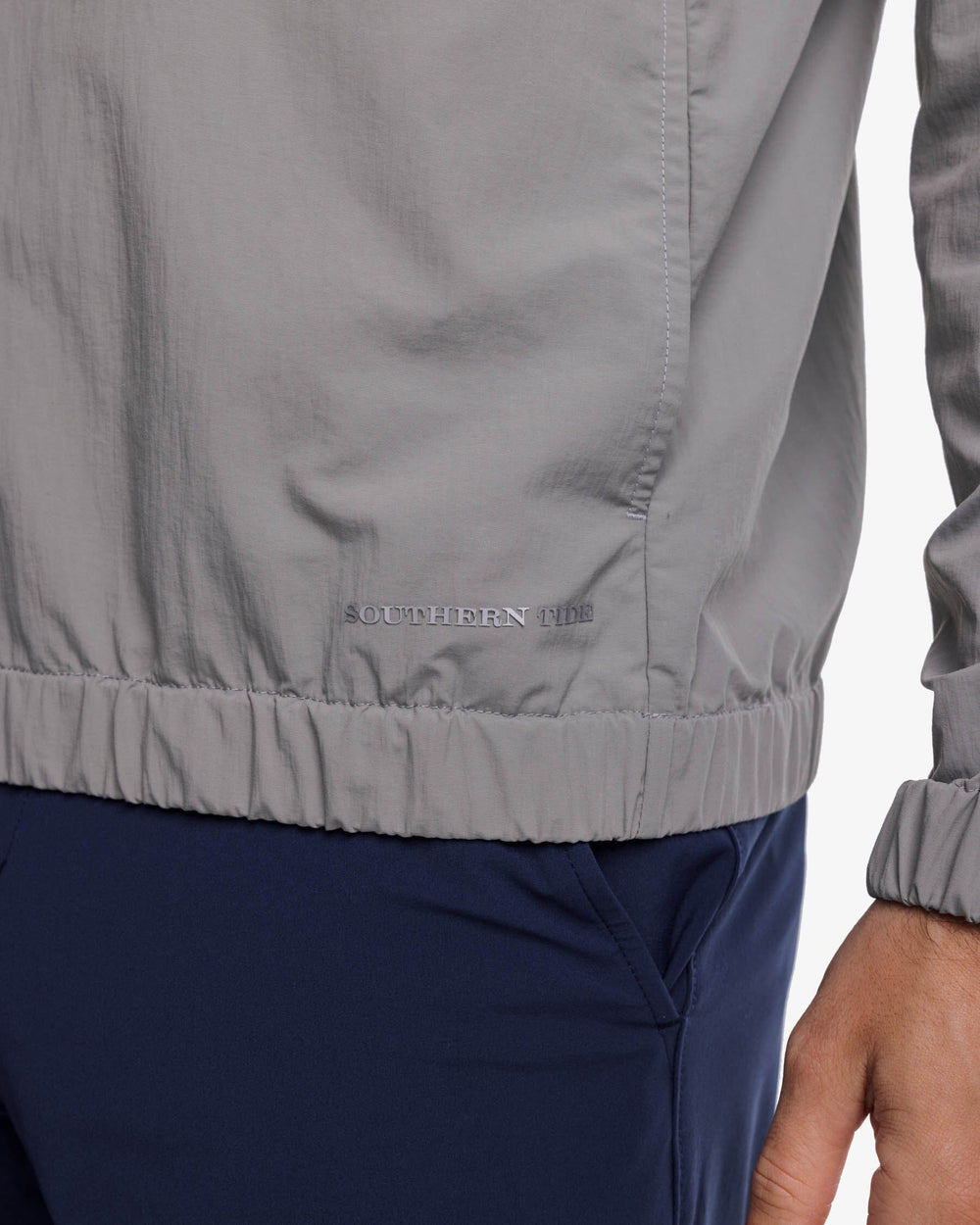 The label view of the Southern Tide Shoreline Performance Pullover by Southern Tide - Frost Grey