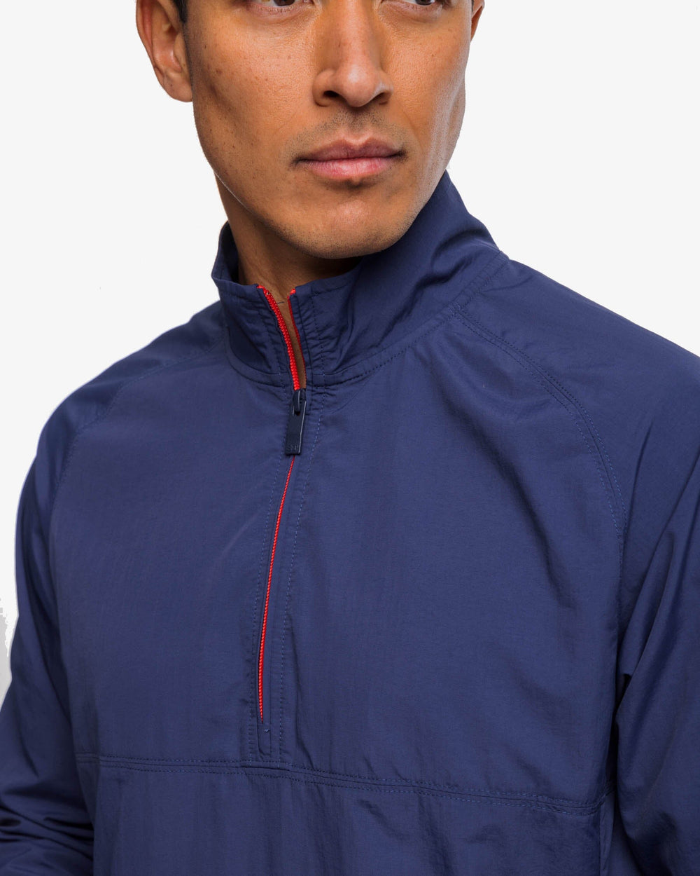 The detail view of the Southern Tide Shoreline Performance Pullover by Southern Tide - True Navy